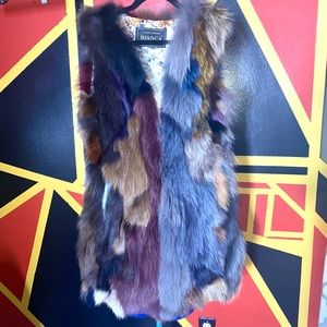 Multi color fox fur vest.. Beautiful must have fur vest!